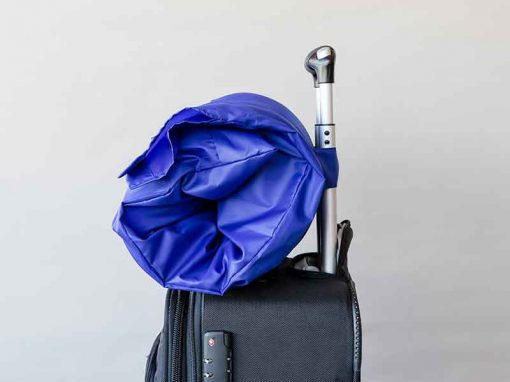 Side view of SleepKeeper on hand luggage suitcase