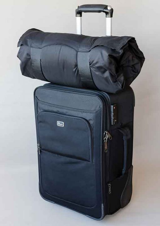 Black SleepKeeper on hand luggage