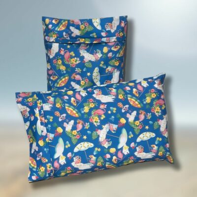 A beautiful cotton printed pillowcase with Flamingoes, umbrellas and flowers in all different directions.